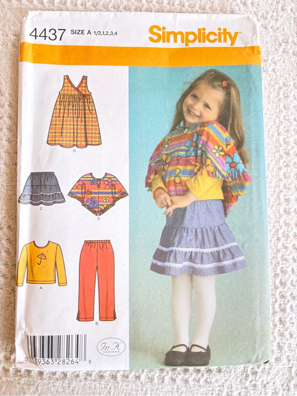 Simplicity 4437 A for Baby/Toddler Pants, Skirt, Jumper, Knit Top, and Poncho